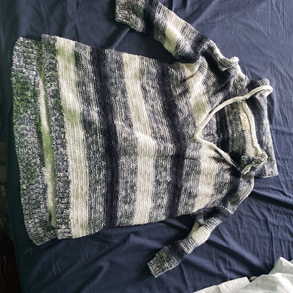 High low sweater with a hood